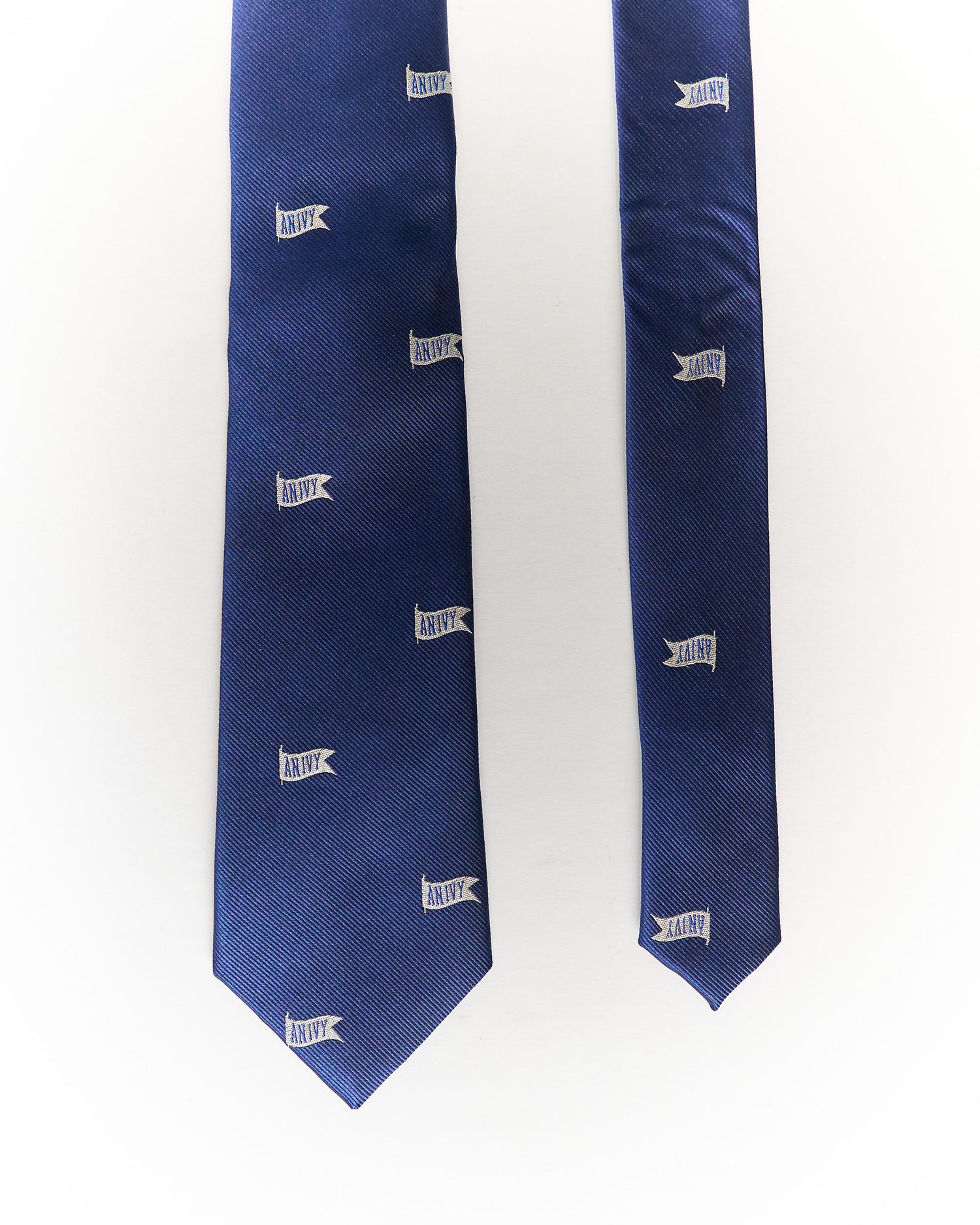 An Ivy Blue Navy Logo Crest Hand Made Silk Tie