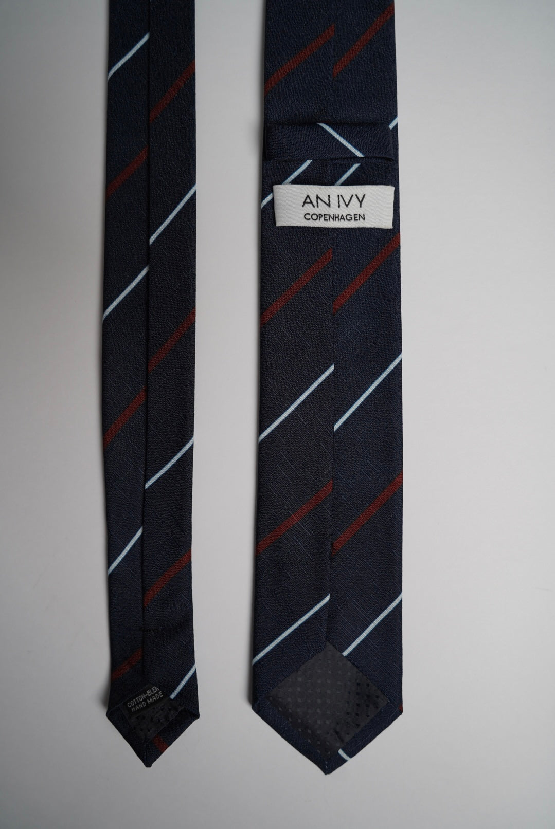 An Ivy Copenhagen Navy Striped Slim Ivy League Cotton Blend Tie